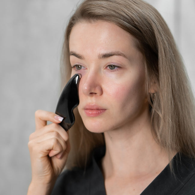 Glov Face Trainer nowoczesny masażer Gua Sha Black