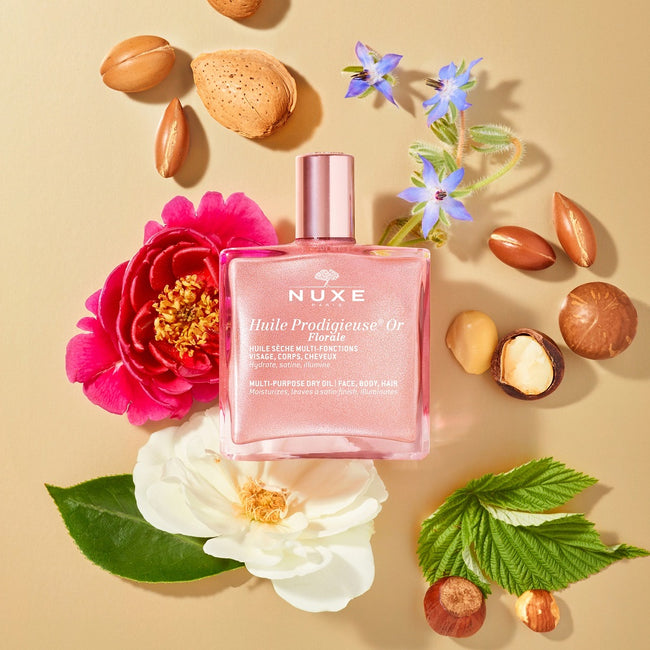 Nuxe Ready Go Glow zestaw suchy olejek regenerujący 10ml + nawilżające serum powiększające usta 8ml + gumka do włosów
