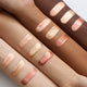 KIKO Milano Glow Fusion Gleam Dream Highlighter rozświetlacz do twarzy w płynie z aplikatorem gąbkowym 14ml