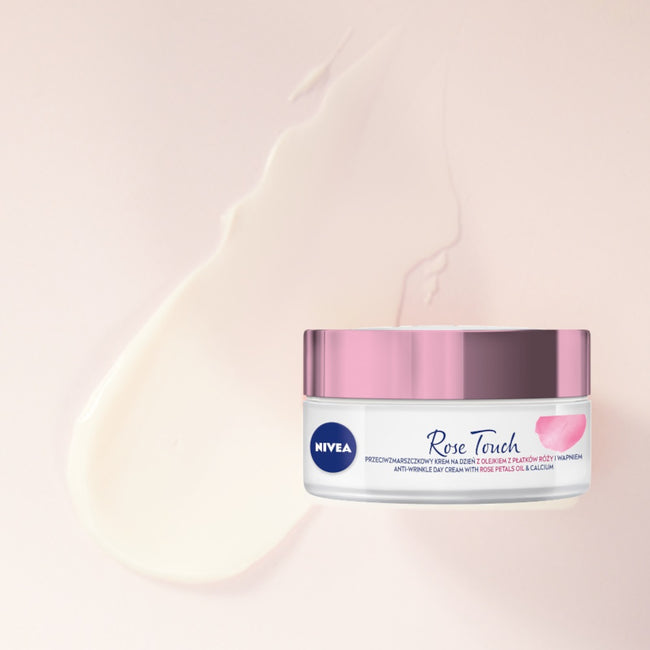 Nivea Rose Elegance zestaw przeciwzmarszkowy krem na dzień 50ml + przeciwzmarszczkowy krem na noc 50ml + kosmetyczka