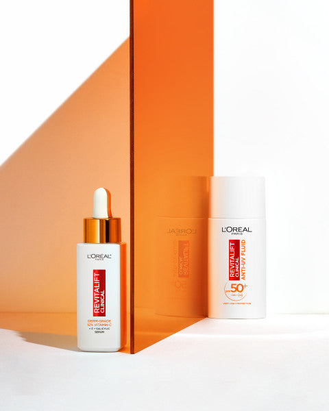 L'Oreal Paris Revitalift Clinical zestaw rozświetlające serum do twarzy 30ml + rozświetlający krem na dzień SPF50+ 50ml
