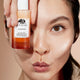 Origins GinZing™ Into the Glow Brightening Serum serum rozświetlające z witaminą C i kwasami AHA i BHA wkład 30ml