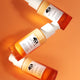 Origins GinZing™ Into the Glow Brightening Serum serum rozświetlające z witaminą C i kwasami AHA i BHA wkład 30ml