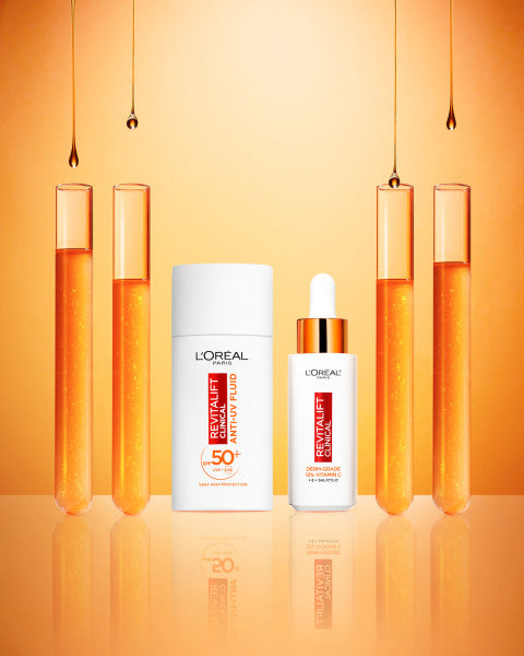 L'Oreal Paris Revitalift Clinical zestaw rozświetlające serum do twarzy 30ml + rozświetlający krem na dzień SPF50+ 50ml